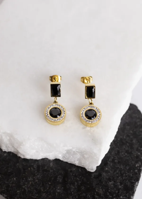 Round pendant earring with lobes