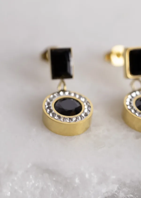 Round pendant earring with lobes