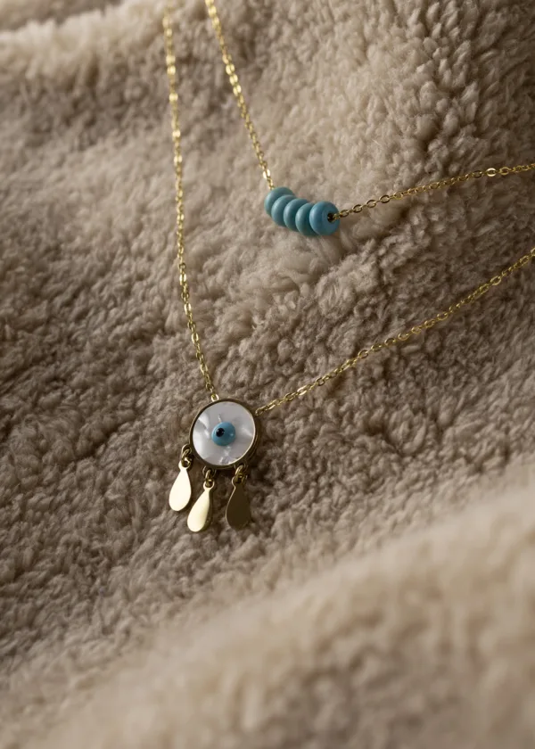 Durin chain with blue beads and a circular eye pendant