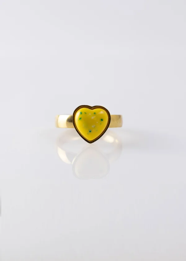Heart ring with a yellow lobe dotted with green