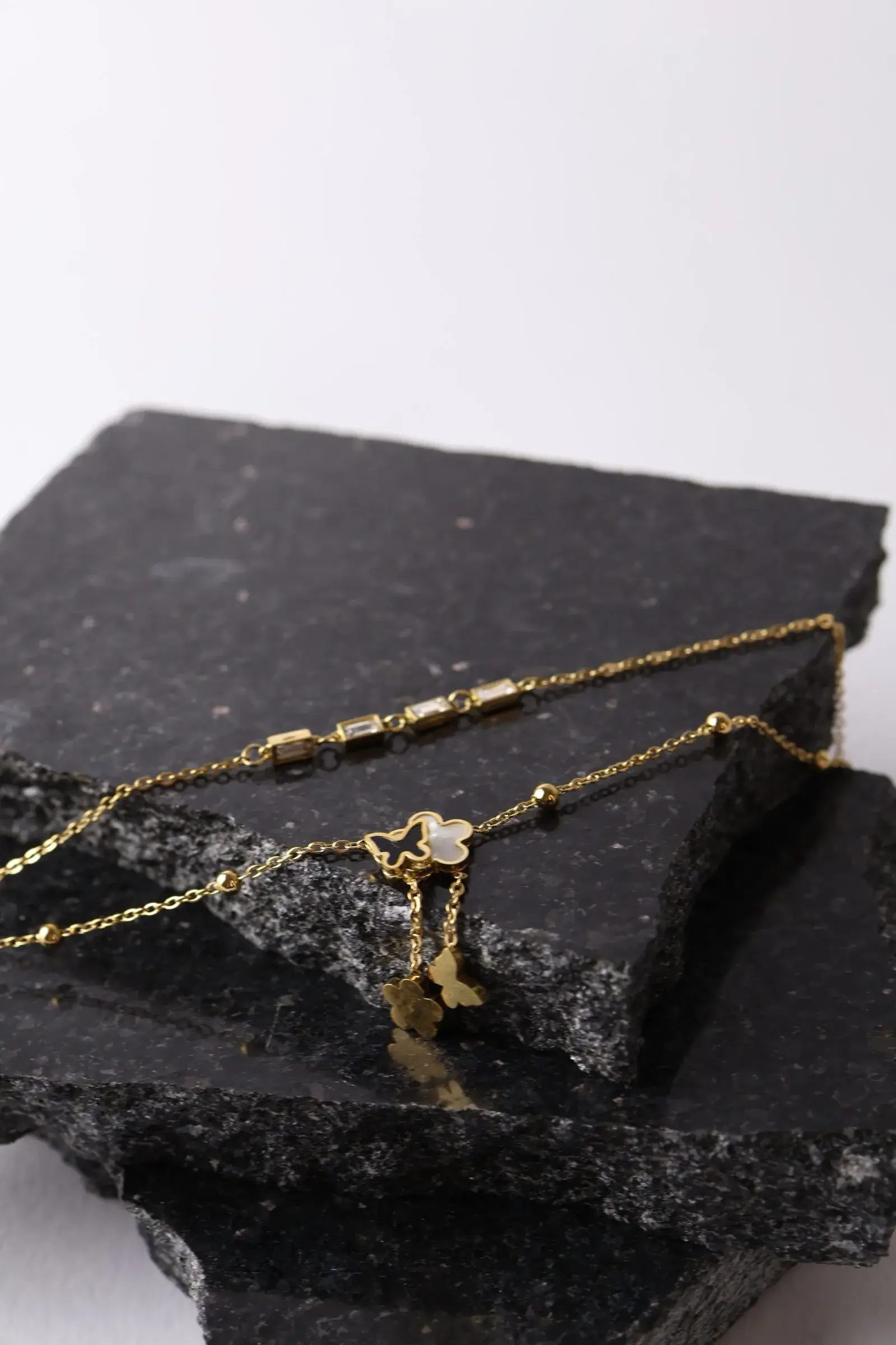 Anklet with 2 rounds of roses, butterfly pendants, and rounds of zirconium lobes - Image 2