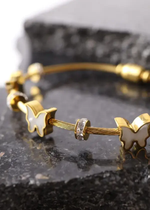 Wide butterfly bracelet with zircon lobes