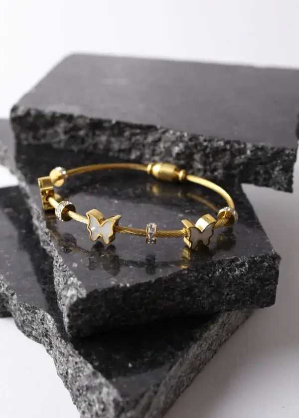 Wide butterfly bracelet with zircon lobes