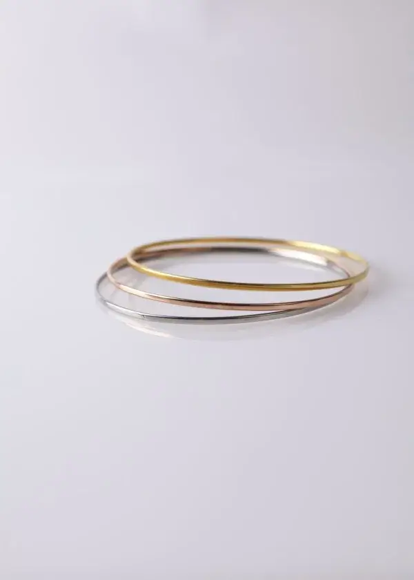 Set of 3 gold, silver and rose gold bracelets, diameter 6 cm