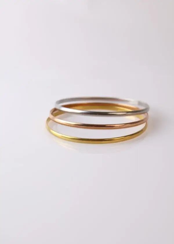 Set of 3 gold, silver and rose gold bracelets, diameter 7 cm