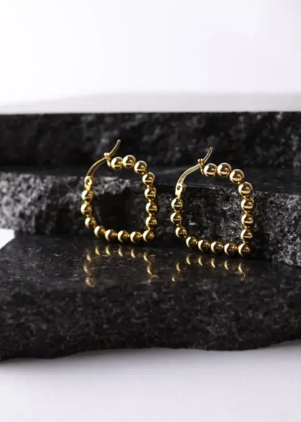 Heart-shaped earring with open top