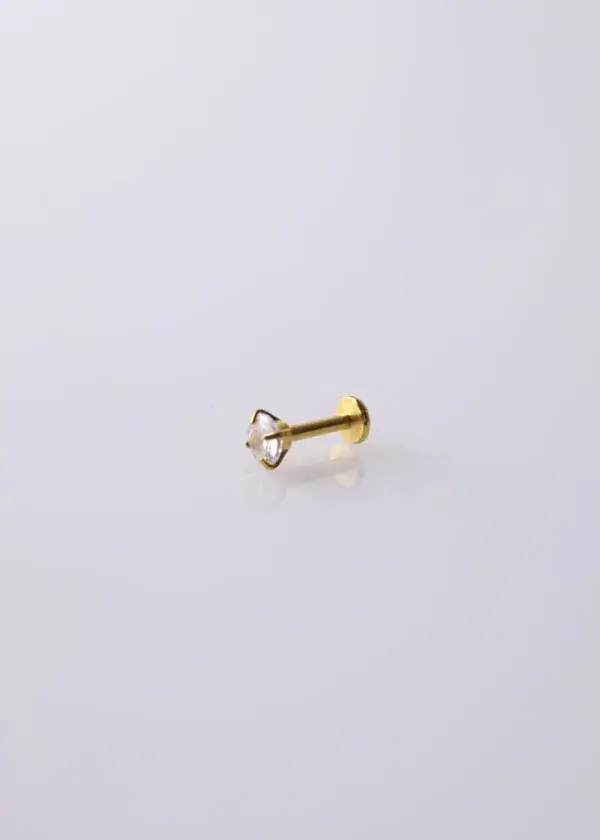 Piercing ear with zircon
