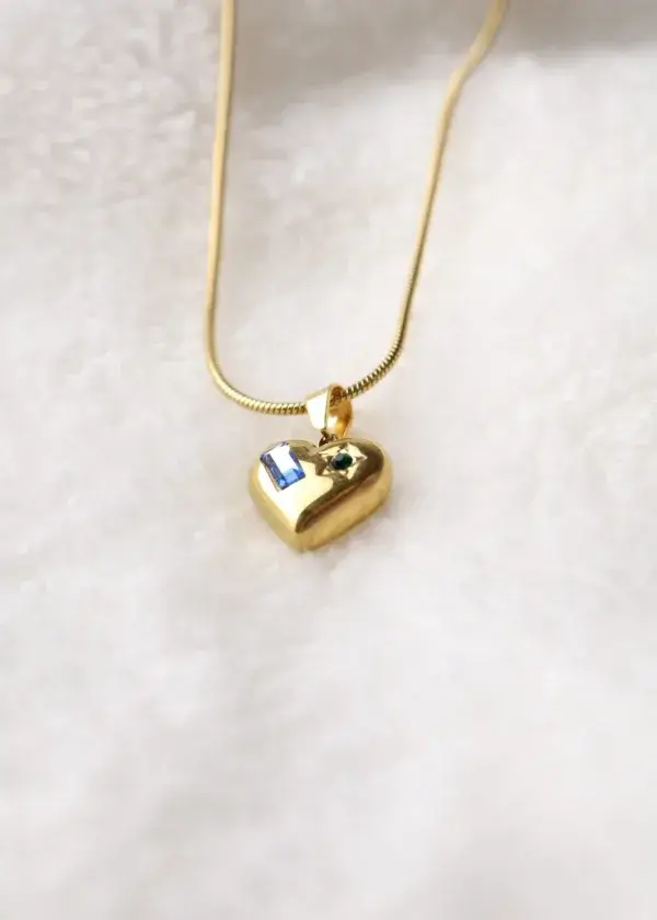 A heart chain with a rectangular zircon stone and an engraved star