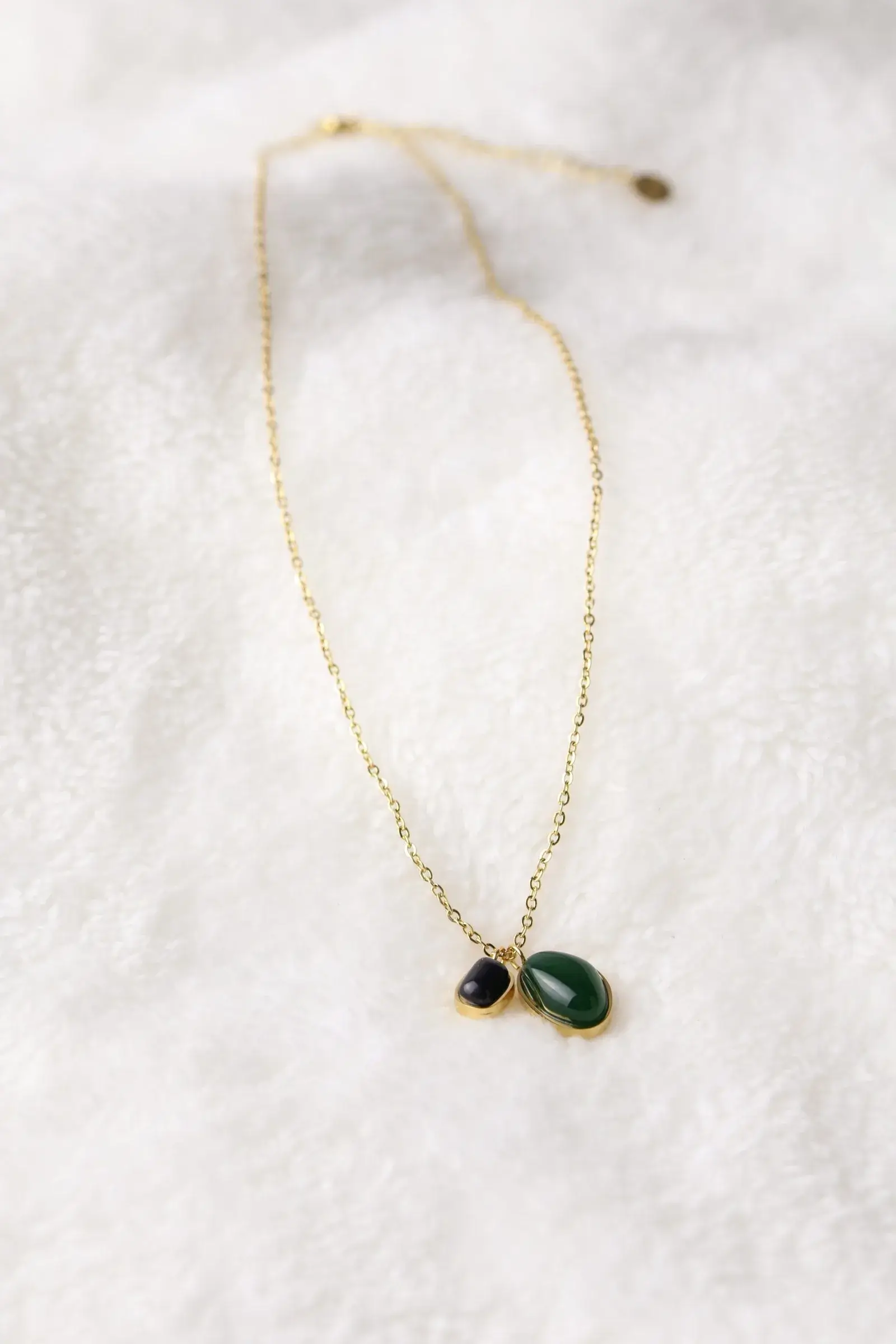 A chain of two bracelets with black and olive beads - Image 2