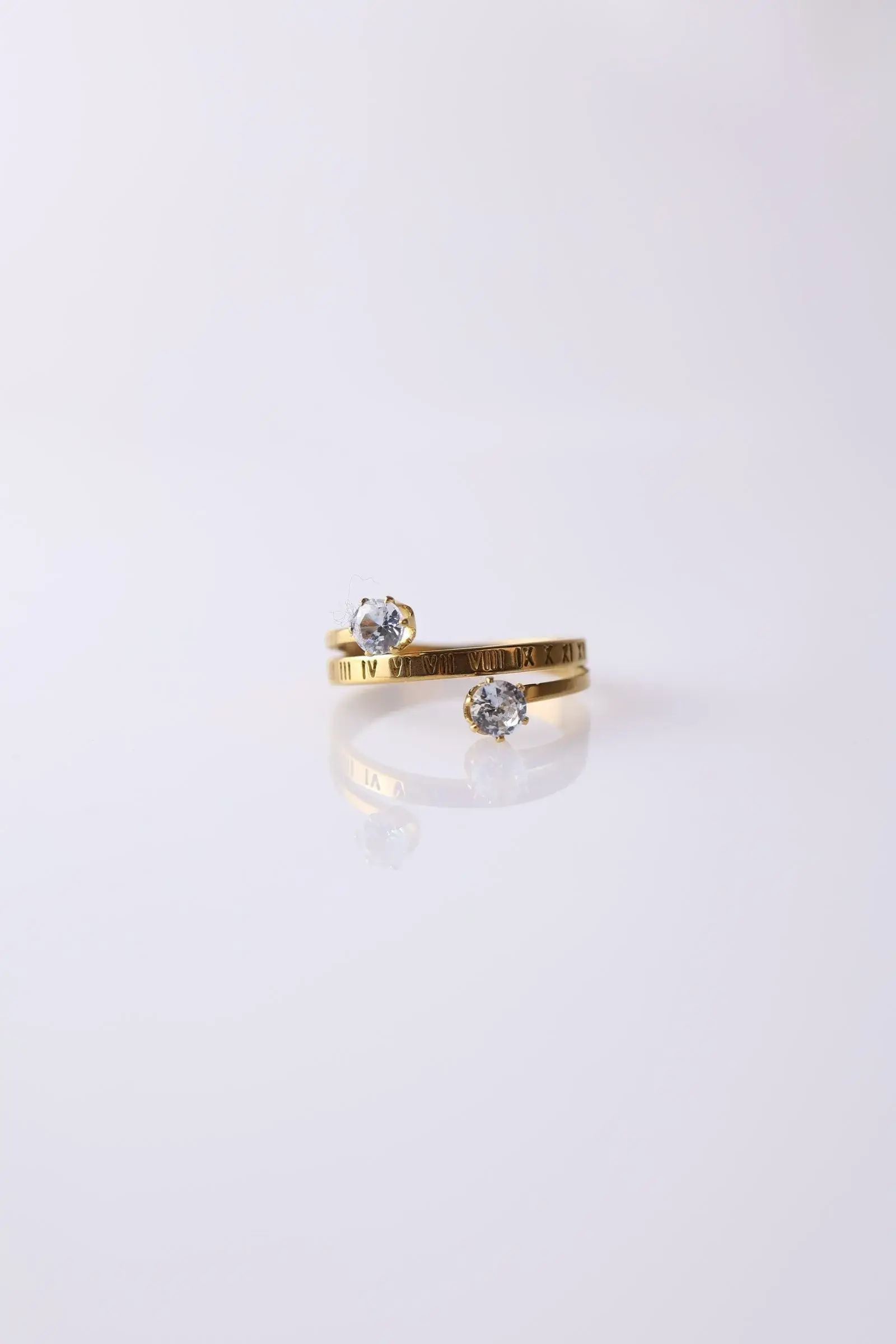 Open ring with Latin numbers and two zirconium lobes - Image 2